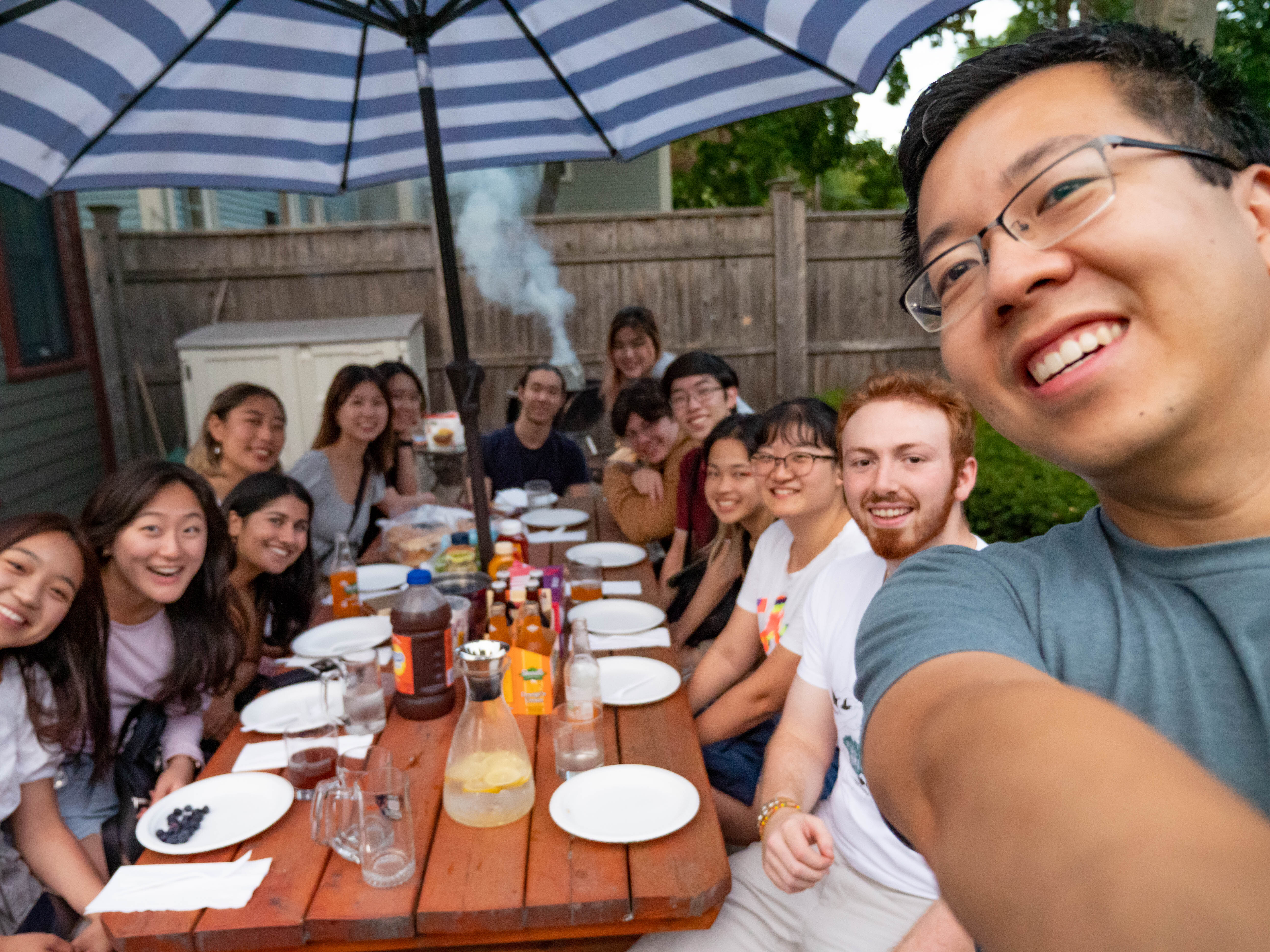 the uiux team enjoying a bbq